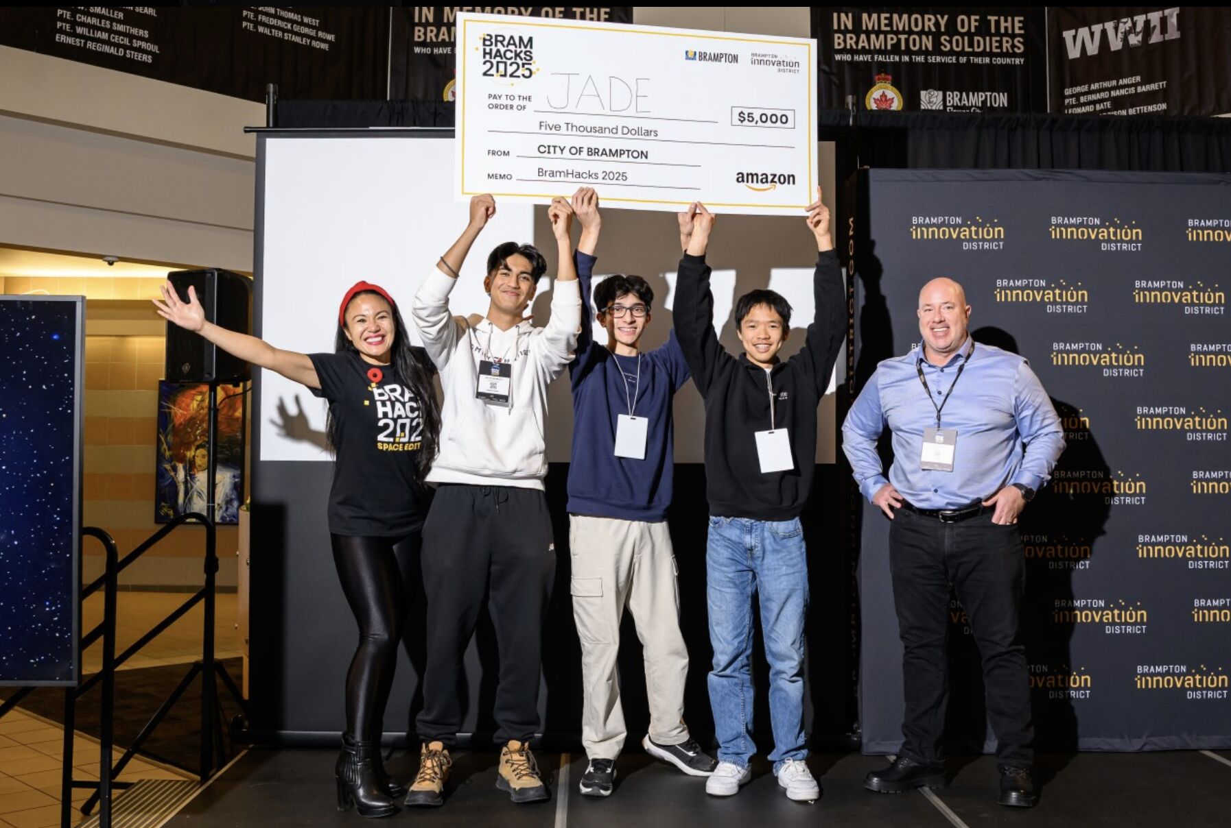 Our team holding the $5,000 BramHacks first-place cheque